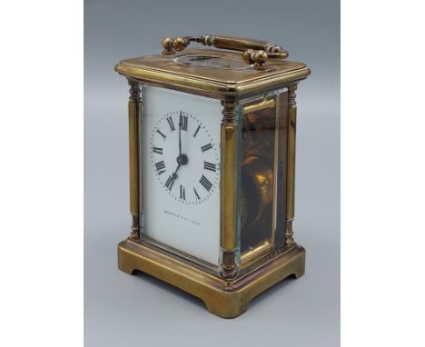 A brass cased Carriage clock retailed by Mappin and Webb with lever escapement 