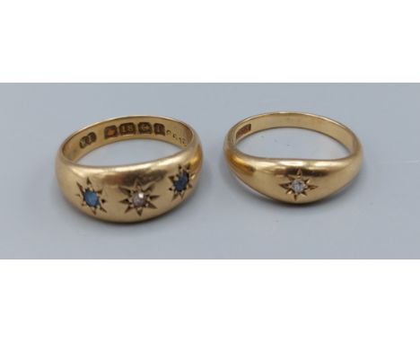 An 18ct gold gypsy ring set with two sapphire and a diamond together with another similar set solitaire diamond, 7gms, ring s