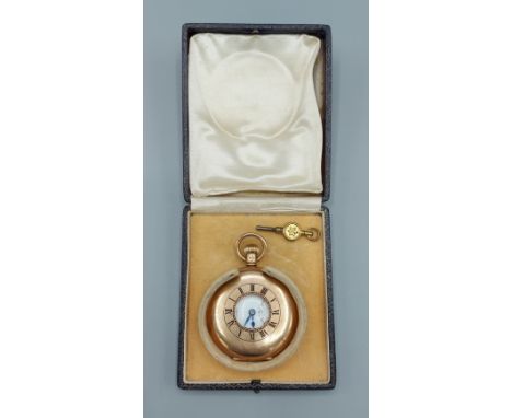 A 9ct gold cased half hunter pocket watch by J.W. Benson, the enamel dial with Roman numerals and subsidiary seconds dial, co