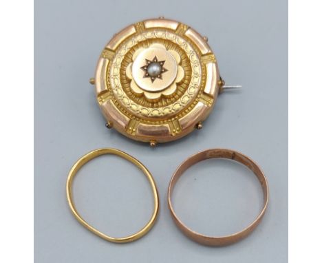 A 22ct gold wedding band 1.4gms together with a 9ct gold wedding band, 1.4gms and a Victorian pearl set brooch 