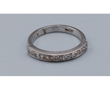 An 18ct white gold and diamond set half eternity ring, ring size L, 3.7gms 