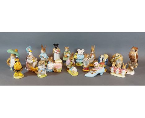 A collection of seventeen Beswick Beatrix Potters figures to include Peter Rabbit, Pickles, Simpkin and others together with 