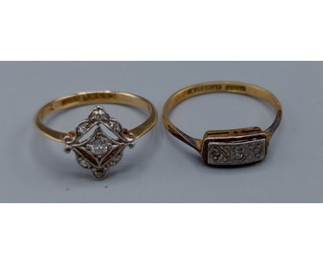 An 18ct gold diamond cluster ring together with another 18ct gold three stone diamond ring, 3.4gms, ring size I and L 