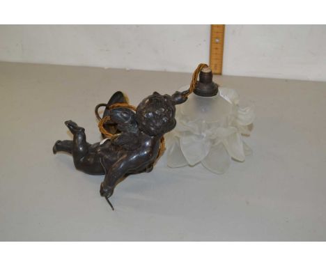 Bronzed metal and frosted glass light fitting formed as a flying cherub