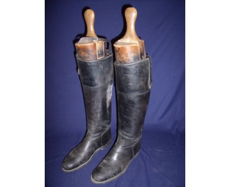 Pair of gents black leather size 11 hunting boots with rolled over tops complete with vintage wooden trees 