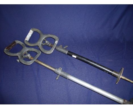 Two vintage adjustable height shooting sticks 