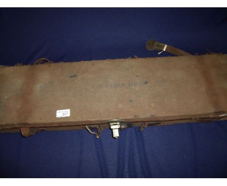Vintage canvas and leather gun case with part fitted interior to take 30inch barrels 
