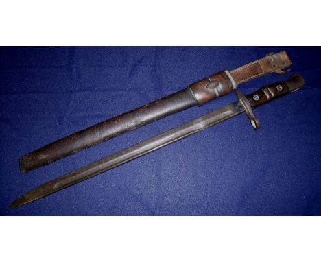 1913 Remington type bayonet with two piece wooden grip complete with part leather scabbard and frog 