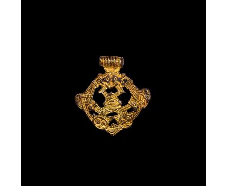 10th-11th century AD. A Borre-type openwork pendant with integral suspension loop; the plaque with ribbed border and two cat-