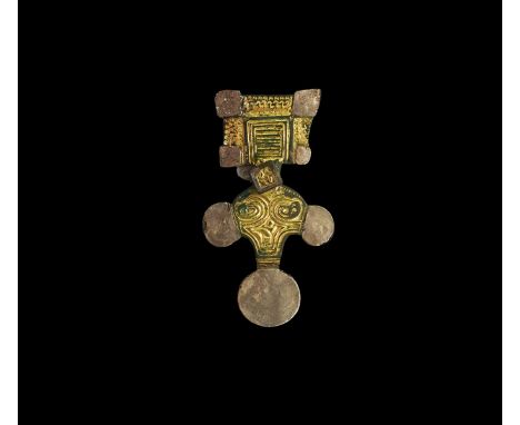 6th century AD. A gilt-bronze square-headed brooch with applied silver plaques comprising rectangular head-plate, shallow bow