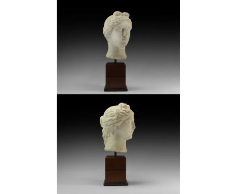 1st-2nd century AD. The goddess of love depicted with youthful idealising features on a slender neck, hair dressed in a chign