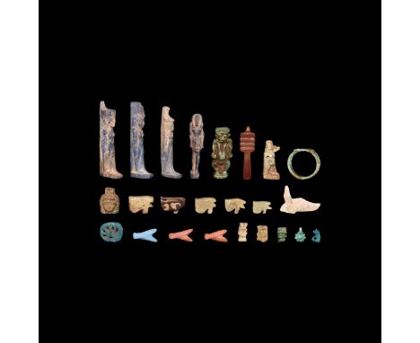 Mainly Late Period, 664-332 BC. A mixed group of glazed composition amulets including djed pillar, wedjat, Isis with dorsal p