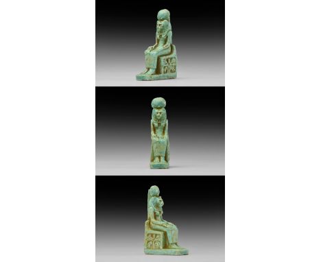 26th Dynasty, 664-525 BC. A glazed composition amuletic figure of lioness-headed goddess Sekhmet seated on a throne with dors