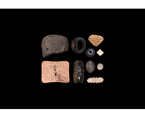 Mainly 3rd-2nd millennium BC. A mixed group of stone and ceramic seals and beads, including four accompanied by a typed and s