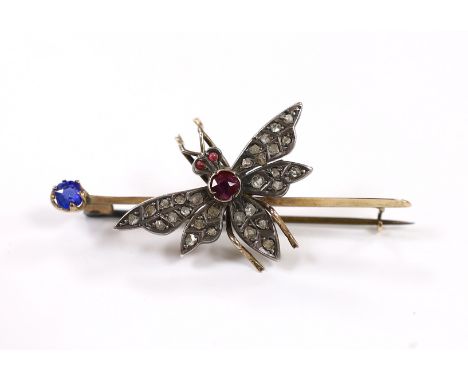 A Victorian yellow metal, rose cut diamond, ruby and blue stone doublet set bug bar brooch, 54mm, gross weight 7.3 grams.