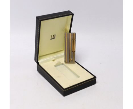 A cased Dunhill lighter