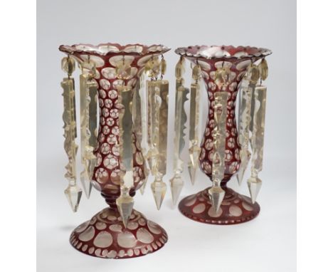 A pair of late 19th century Bohemian ruby flashed glass lustres, 30cm tall