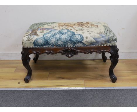 A Victorian carved mahogany dressing stool, re-upholstered in a William Morris-designed fabric, The Brook Tapestry, width 80c