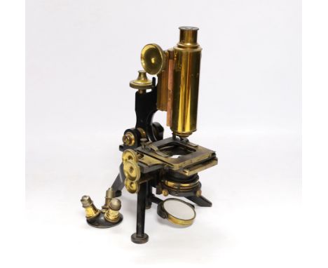 A Victorian monocular brass and black enamel microscope by W. Watson &amp; Sons, High Holborn, in a mahogany carrying case, S