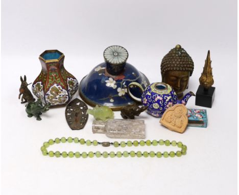 A collection of Chinese and other Oriental items including a cloisonné enamel vase, carved elephants and Buddhas head, larges