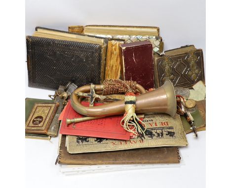 Sundry items including ephemera, empty Victorian photograph albums, bugle, miniature books, rosary and silver lidded glass po