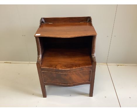 A George III mahogany serpentine front commode, width 56cm, depth 52cm, height 75cm