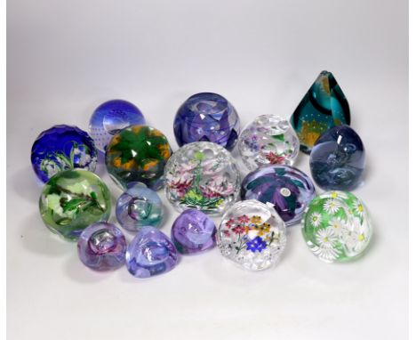 A collection of sixteen modern Caithness glass paperweights with boxes including some limited edition, largest 8cm high