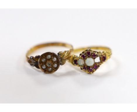 A Victorian 18ct gold, white opal and garnet cluster set dress ring, (opal missing), size J/K, gross weight 1.9 grams and a 1