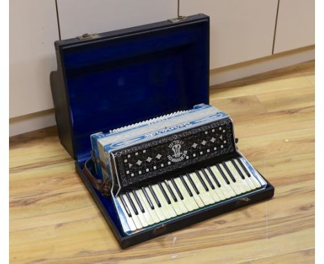 A cased Bernadi piano accordion