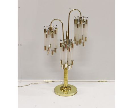 A contemporary brass and perspex three branch table lamp, height 91cm
