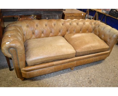 A leather Chesterfield style sofa