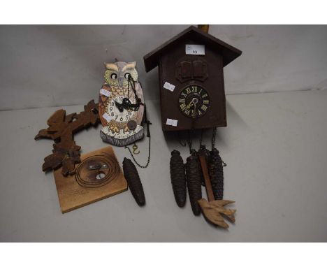 Modern cuckoo clock and one other