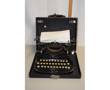 Cased folding typewriter