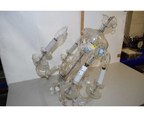 A modern clear glass mounted chandelier