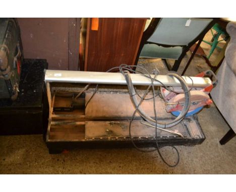 A Diamant Rubi commercial tile cutter