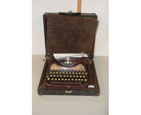 A cased Corona typewriter