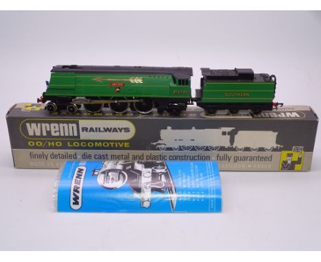OO GAUGE - A Wrenn W2276/5P streamlined West Country class locomotive in SR green 'Exeter', Golden Arrow version. VG-E in VG 