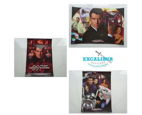 TOMORROW NEVER DIES: A group of three over sized lobby card / UK landscape mini posters to include: one portrait, one landsca