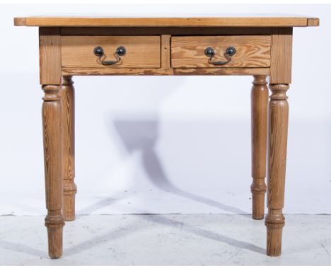 Pine kitchen table, rectangular boarded top with cleated ends, two frieze drawers, turned legs, the top 94 x 66cm; and two be