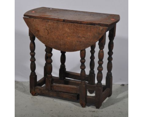 Late 19th century oak gate leg table, barley twist supports, W62cm x D32cm x H62cm.