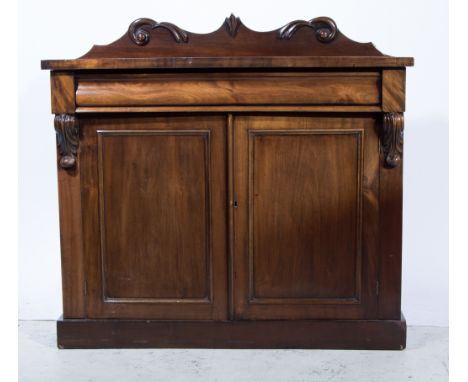 Victorian mahogany chiffonier, scrolled back rectangular top, frieze drawer, panelled cupboards enclosing a shelf flanked by 