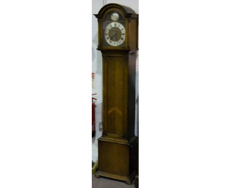 Late 20th century oak longcase clock, arched dial with silvered chapter ring, applied with figural spandrels, height 192cm   