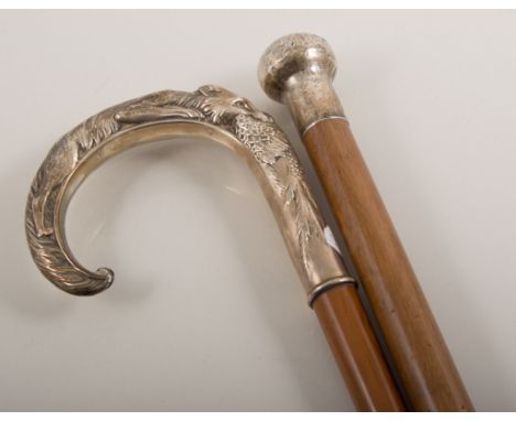 Walking cane, hallmarked silver top, 93cm; a silver handled stick, the handle fashioned as a fox hunting a pheasant, with hor