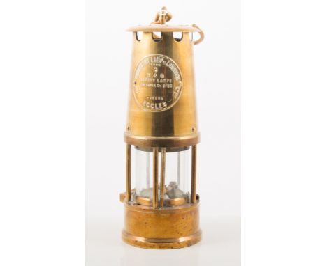 Brass Miner's lamp, labelled 'The Protector Lamp and Lighting Company, Eccles' Type 6', 24cm together with a copper coal scut