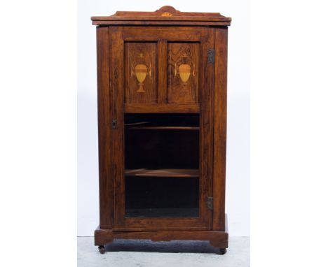 Victorian walnut music cabinet, rectangular top with a shallow gallery, boxwood stringing and fanned spandrels, the door with