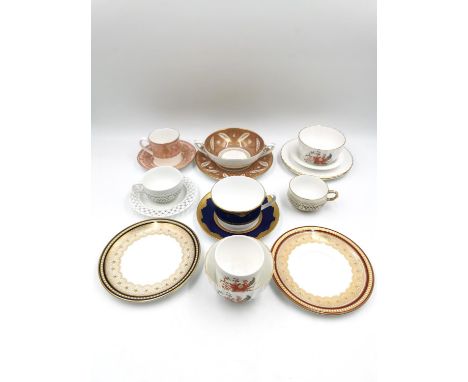 Two 19th century honeycomb reticulated Sevres cups, one with a saucer, along with a Royal Worcester twin-handled tea cup and 