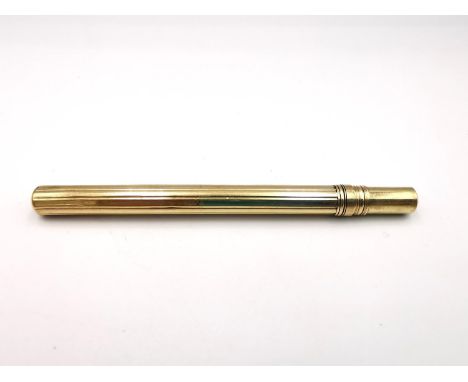 A gilt retractable fountain pen. L.8.9cm as a pen L.10.7cm 8.64g gross