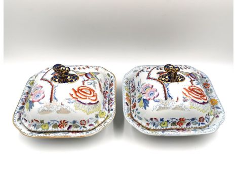 A pair of early 19th century Masons Ironstone covered  tureens, hand painted with the Flying Bird pattern, depicting flowers 