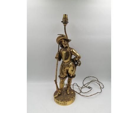A brass figural lamp of a Cavalier, after the original bronze titled 'Rolando' by Edmond Leveque. With title and signature to