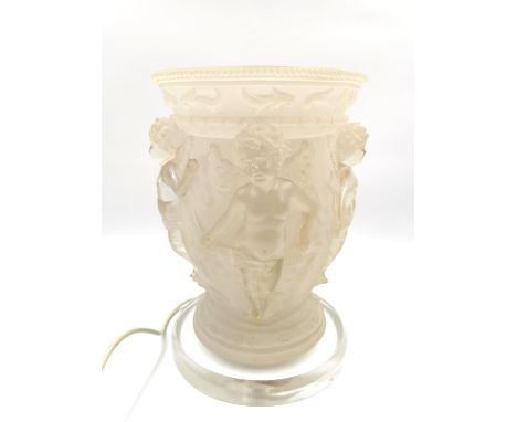 A neoclassical style opaque/frosted moulded lamp with putti/cherub relief decoration, in the style of Rene Lalique. H.30.5 Di